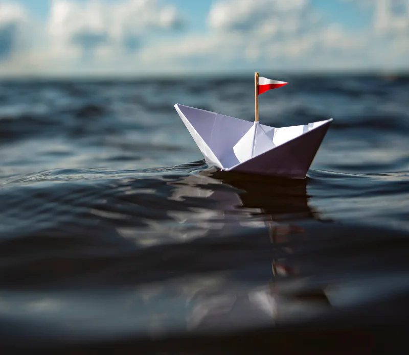 Paper Boat on Water